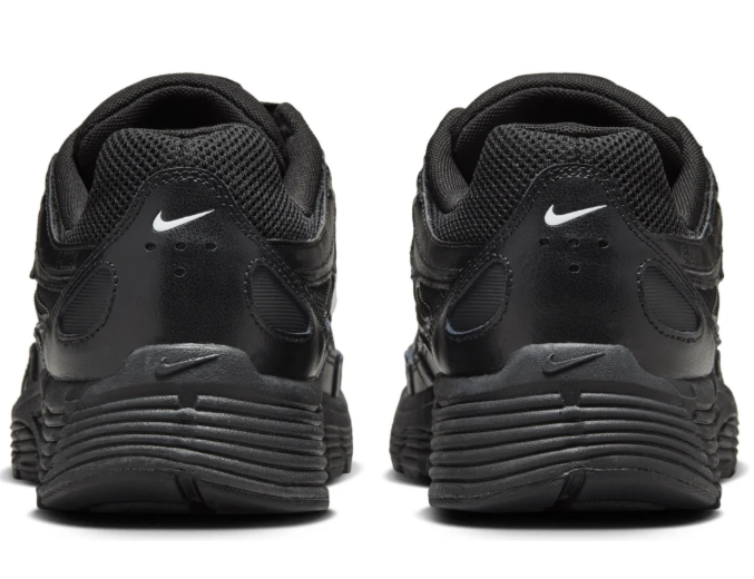 Nike Black Low-Top Sneakers with White Swoosh
