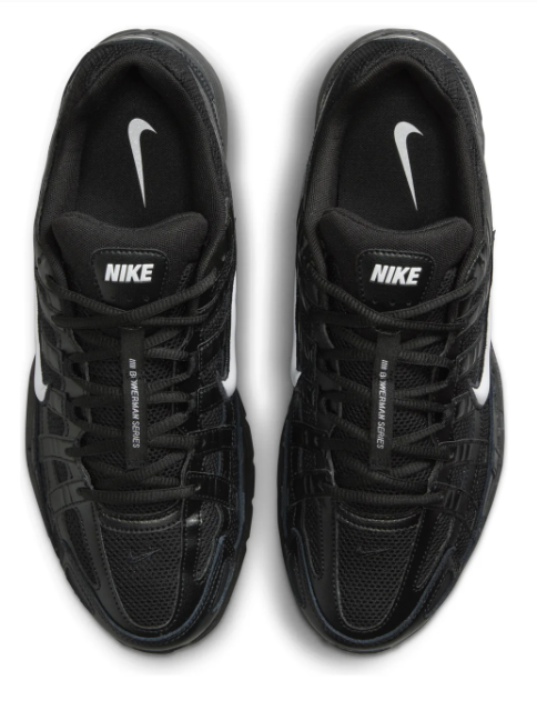 Nike Black Low-Top Sneakers with White Swoosh